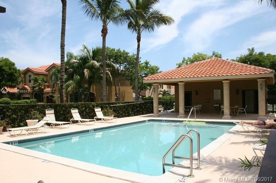 COZY TWO-STORY TOWNHOME IN EAST KENDALL WITH 3BEDS/2.5BATHS PLUS CONVERTED GARAGE FOR ADDED LIVING SPACE, OFFICE OR DEN. ALL 3BEDS ARE UPSTAIRS WITH HARDWOOD FLOORS, MASTER BEDROOM HAS CUSTOM CLOSET CABINETRY AND TRANQUIL SPA-LIKE BATH. CHARMING PATIO HAS LUSH LANDSCAPING REPLETE WITH BUILT IN BBQ. NICELY MAINTAINED COMMUNITY HAS SECURED ENTRY AND POOL FOR RESIDENTS.