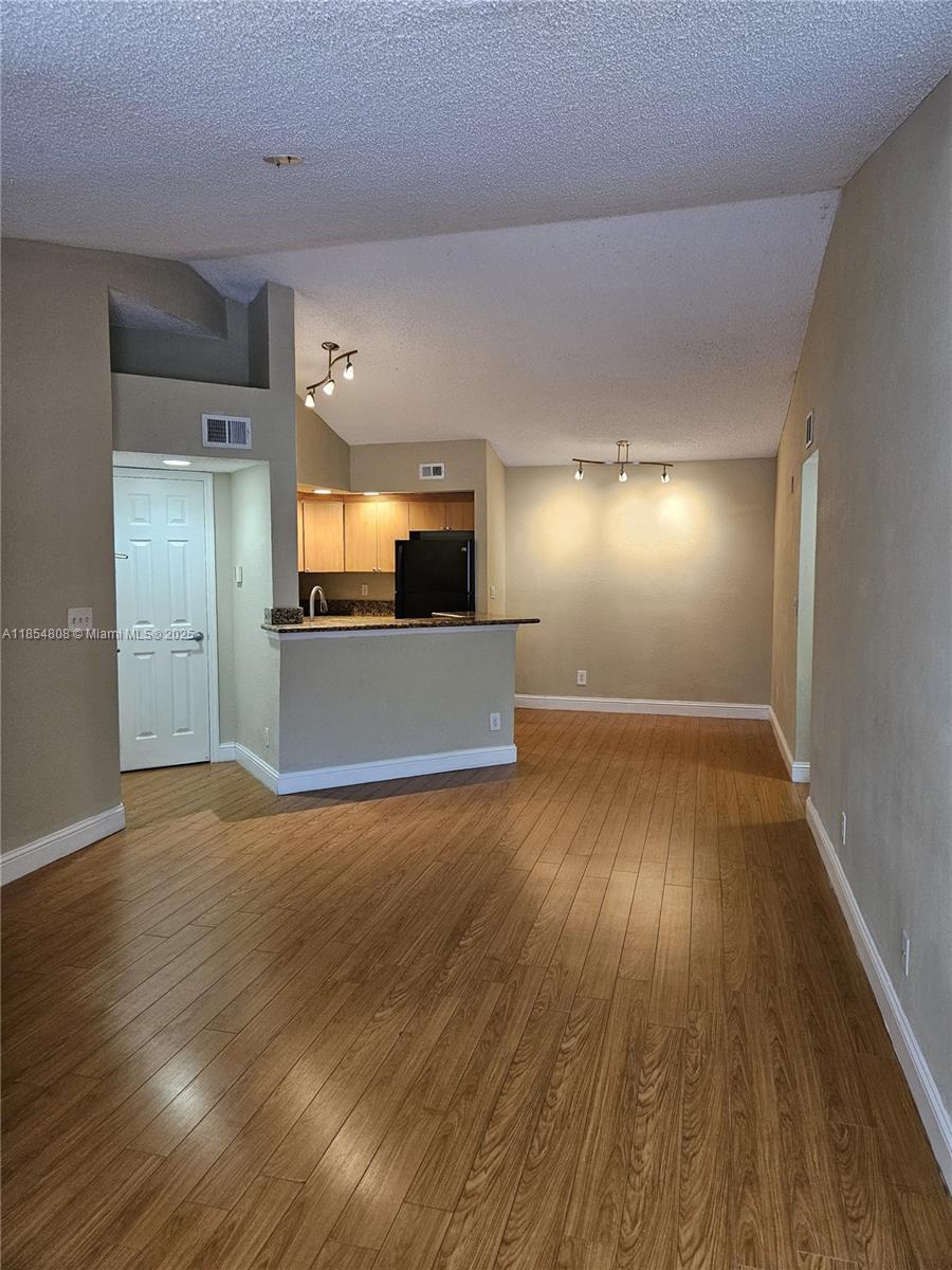 **Live Where Convenience Meets Comfort! ** Step into this charming 1-bedroom, 1-bath home designed for both style and functionality. Recently updated unit with brand new carpet in the bedroom area, new stove & microwave, new blinds, stylish kitchen faucet! In unit full size washer & dryer. Enjoy a resort lifestyle as you unwind by the sparkling pool or spa, stay active at the gym, tennis or racquetball courts, or gather with friends for a barbecue in the picnic areas. Excellent school zone! All of this in a prime location with instant access to I-75, I-595, and the Sawgrass Expressway, plus shopping, dining, and entertainment at Sawgrass Mills just minutes away. Minutes away from Ft. Lauderdale Airport and the nearby beaches. Water is included!!!