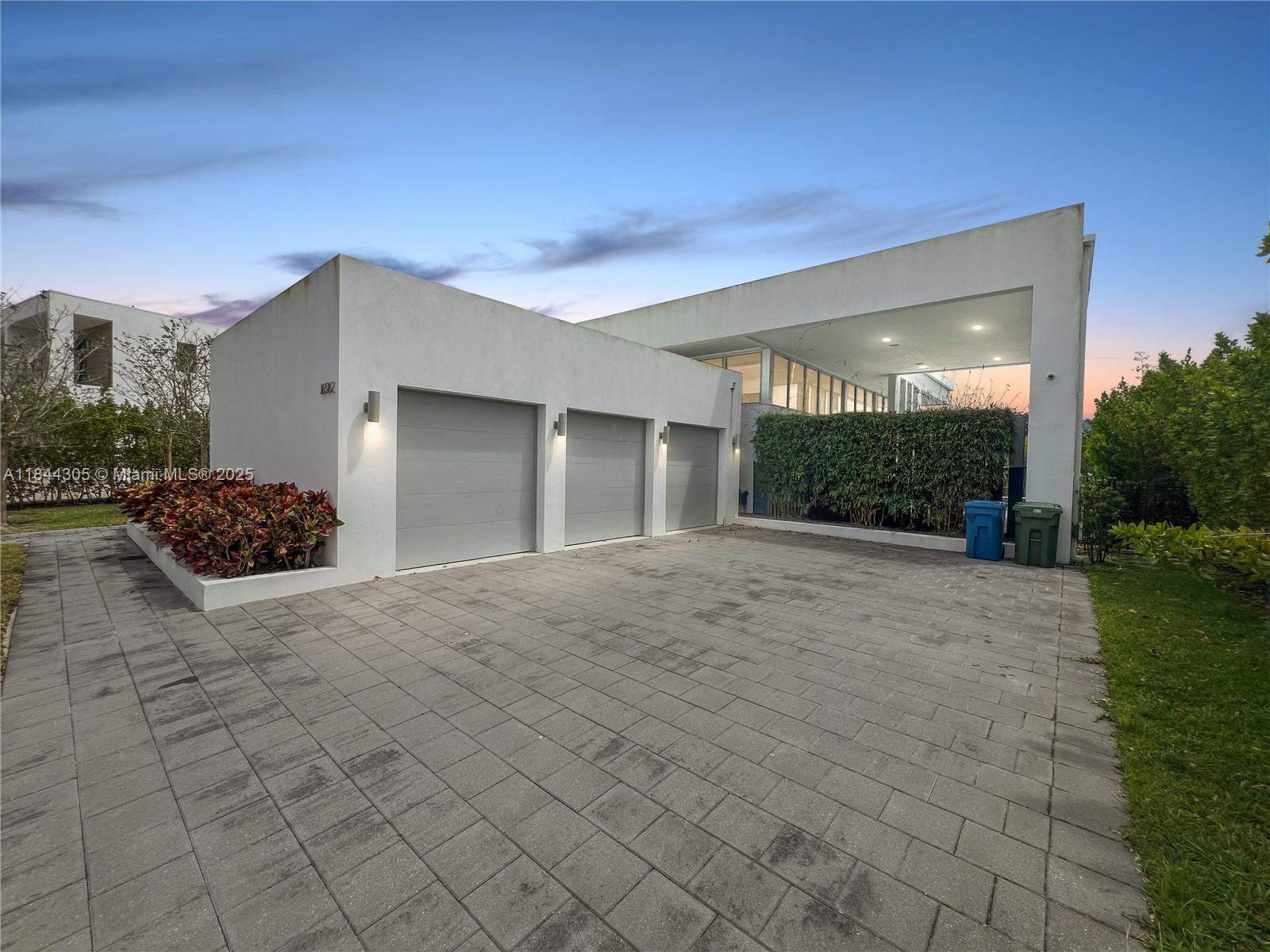 Live in luxury in this spectacular single-story residence located in the exclusive gated community of Botaniko Weston. Built in 2019, this property features 4 spacious bedrooms, 5.5 bathrooms, and a 3-car garage, all spread over 3,389 square feet of elegant and functional space. Its modern design offers high ceilings, abundant natural light, and top-of-the-line finishes. Enjoy an incredible backyard with a private pool, summer kitchen, and wet bar—perfect for entertaining family and friends. Sliding glass doors seamlessly connect the indoor and outdoor living areas. Botaniko Weston offers privacy, security, and an unbeatable location near top-rated schools, restaurants, shops, and golf courses. This is an opportunity you don’t want to miss!