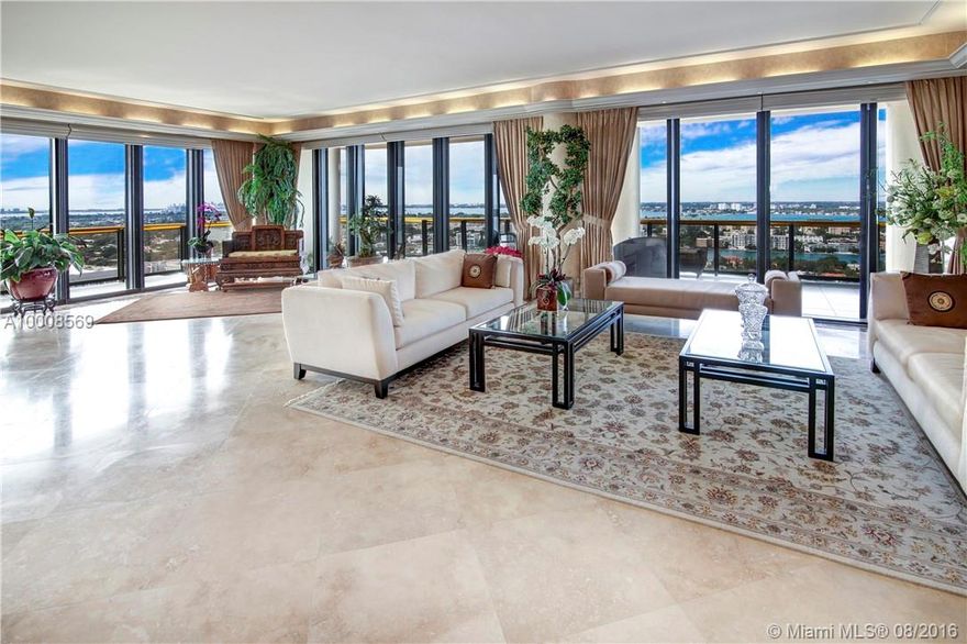 Magnificent 6,444 sq ft  penthouse with spacious wraparound terraces & sweeping views of the ocean, Biscayne Bay, & the entire Miami skyline. This opulent unit features 3 bedrooms, 4 baths, powder room, cedar wood dry sauna, elegant office & staff quarters. Carefully appointed features include: beautiful updated kitchen, expansive master suite, marble floors, custom built-in millwork, recessed lighting, tray ceilings & more. Premiere building offers top-notch services & a renowned private restaurant.