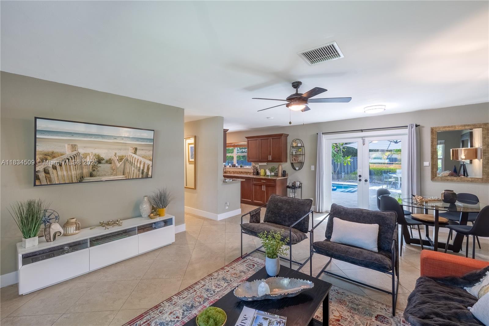 Welcome to your private tropical escape in the heart of Pompano Beach. This beautifully furnished 2-bedroom, 1-bathroom home is the ideal retreat for a relaxing short-term stay, just minutes from the beach, restaurants, and shops. The home features two comfortable bedrooms with quality linens and ample storage, a clean and modern bathroom with tub/shower, and a fully equipped kitchen complete with appliances, cookware, and dining space for four. The backyard boasts a sparkling swimming pool and a soothing jacuzzi/spa.
