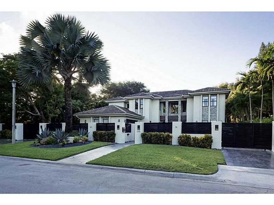 Located in privately guarded Bay Point, this expansive gated estate was built in 2007 & impeccably updated in 2014 w/a modern aesthetic. This luxurious home offers 6 beds, 7 baths & a spacious layout on an oversized 15,359 SF lot. This 5,976 SF 2 story ho me boasts a Viking kitchen, high ceilings, beautiful large pool, Jacuzzi, Koi fish pond, fountains, outdoor bbq, security cameras throughout, driveway that can hold up to 10 cars plus a 2 car garage. Centrally located to all Miami has to offer