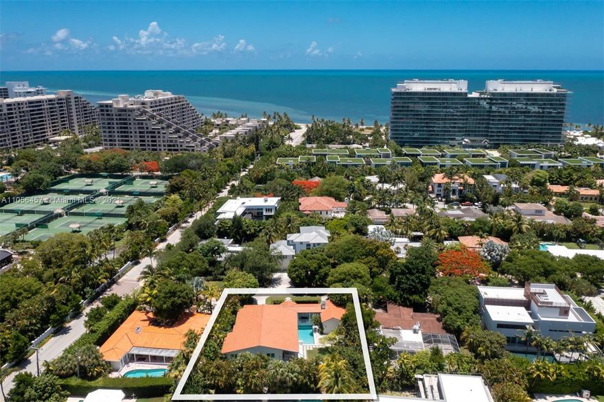 welcome to your Key Biscayne Beach House, located 3 blocks from the beach. Impeccable condition, designed by Village Architects. Located in the Holiday Colony area, the closest neighborhood for single homes to access the beach .One story home. Secluded and private, behind the double blue door an oasis of serenity will welcome you. Covered porch that gives more space to the living room area,direct access to pool and garden area. Oversized master suite with sliding doors opening to the terrace. Large family room , dining , kitchen with high ceilings . Surround  system throughout the home. Built at 10 ft above flood ( see attachment for certificate of elevation). Impact glass doors / windows (expect one small window in laundry area). THE PERFECT HOME