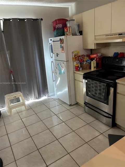 Photo of 7762 W 34th Ln #18-202, Hialeah, FL 33018 (MLS # A11934658)