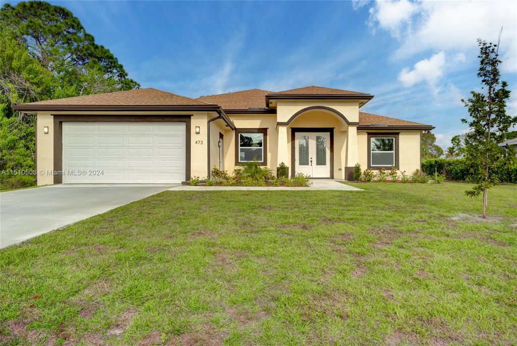 Photo of 473 SW Cherryhill Rd, Port Saint Lucie, FL 34953 (MLS # A11510508)