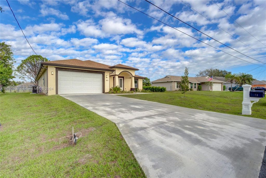 Photo of 473 SW Cherryhill Rd, Port Saint Lucie, FL 34953 (MLS # A11510508)