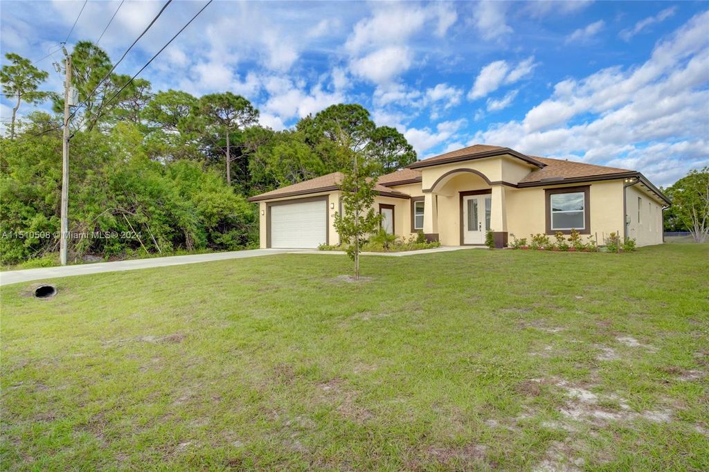 Photo of 473 SW Cherryhill Rd, Port Saint Lucie, FL 34953 (MLS # A11510508)