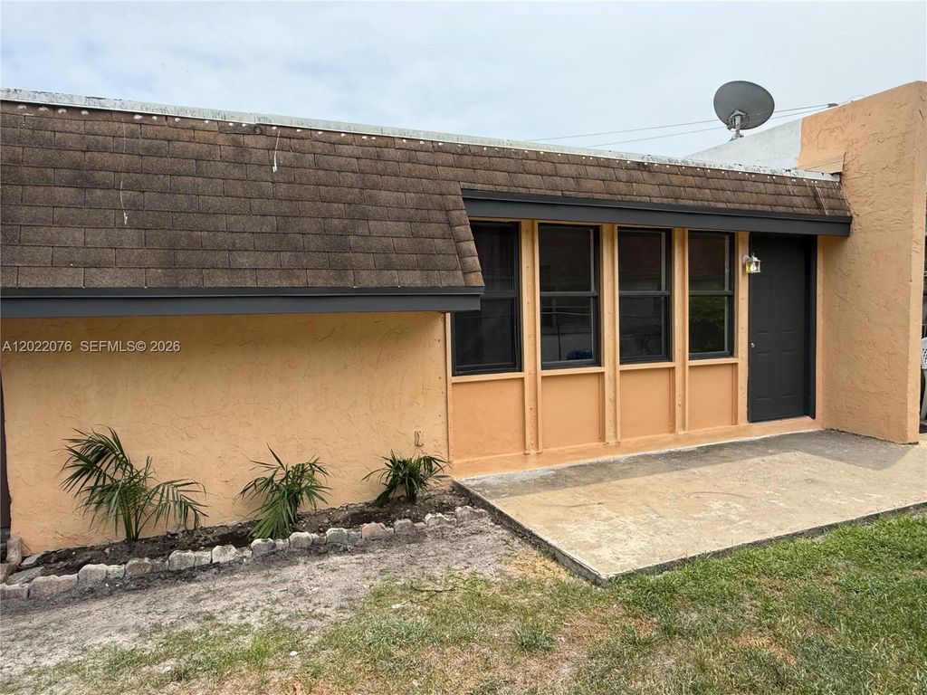 Photo of 1312 NW 8th Ave, Fort Lauderdale, FL 33311 (MLS # A12022076)