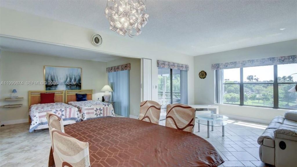 Photo of 2311 S Cypress Bend Dr #419A, Pompano Beach, FL 33069 (MLS # A11999874)