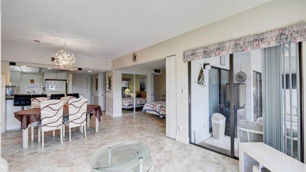 Photo of 2311 S Cypress Bend Dr #419A, Pompano Beach, FL 33069 (MLS # A11999874)