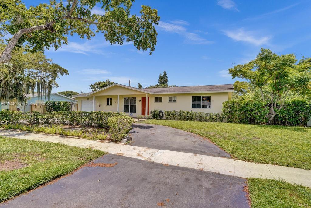 Amazing Opportunity in Plantation Park! Don't miss this beautifully updated 3-bedroom, 2-bath single-family home in the heart of Plantation — with NO HOA! Featuring a remodeled kitchen and bathrooms, a spacious great room perfect for entertaining, 1-car garage, and a circular driveway. The oversized backyard offers room for a pool and includes a versatile He/She shed — ideal for a home office, gym, or creative space! Centrally located between Broward Blvd and Peters Rd, in the sought-after Plantation Park community. Enjoy easy access to top-rated schools, scenic parks, golf courses, shopping, dining, and more. Schedule your private showing today — this gem won't last long!