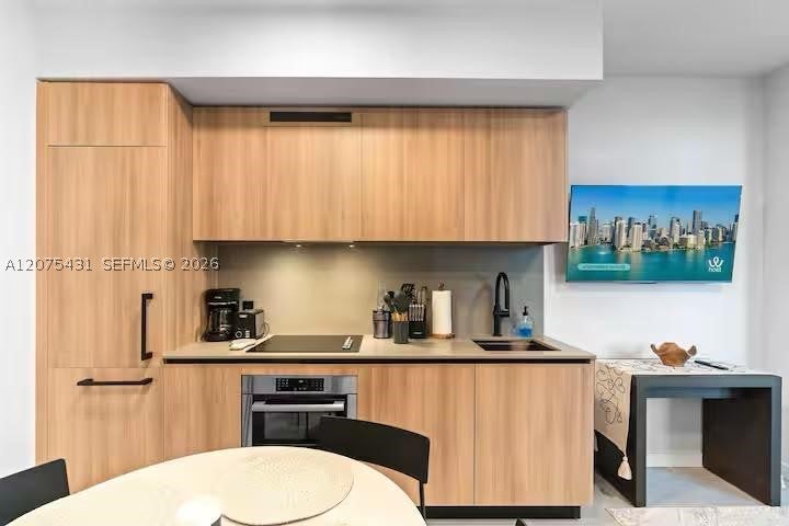 121 NE 5th St 1711