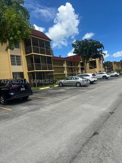 Photo of 3285 Foxcroft Rd #E204, Miramar, FL 33025 (MLS # A12080511)