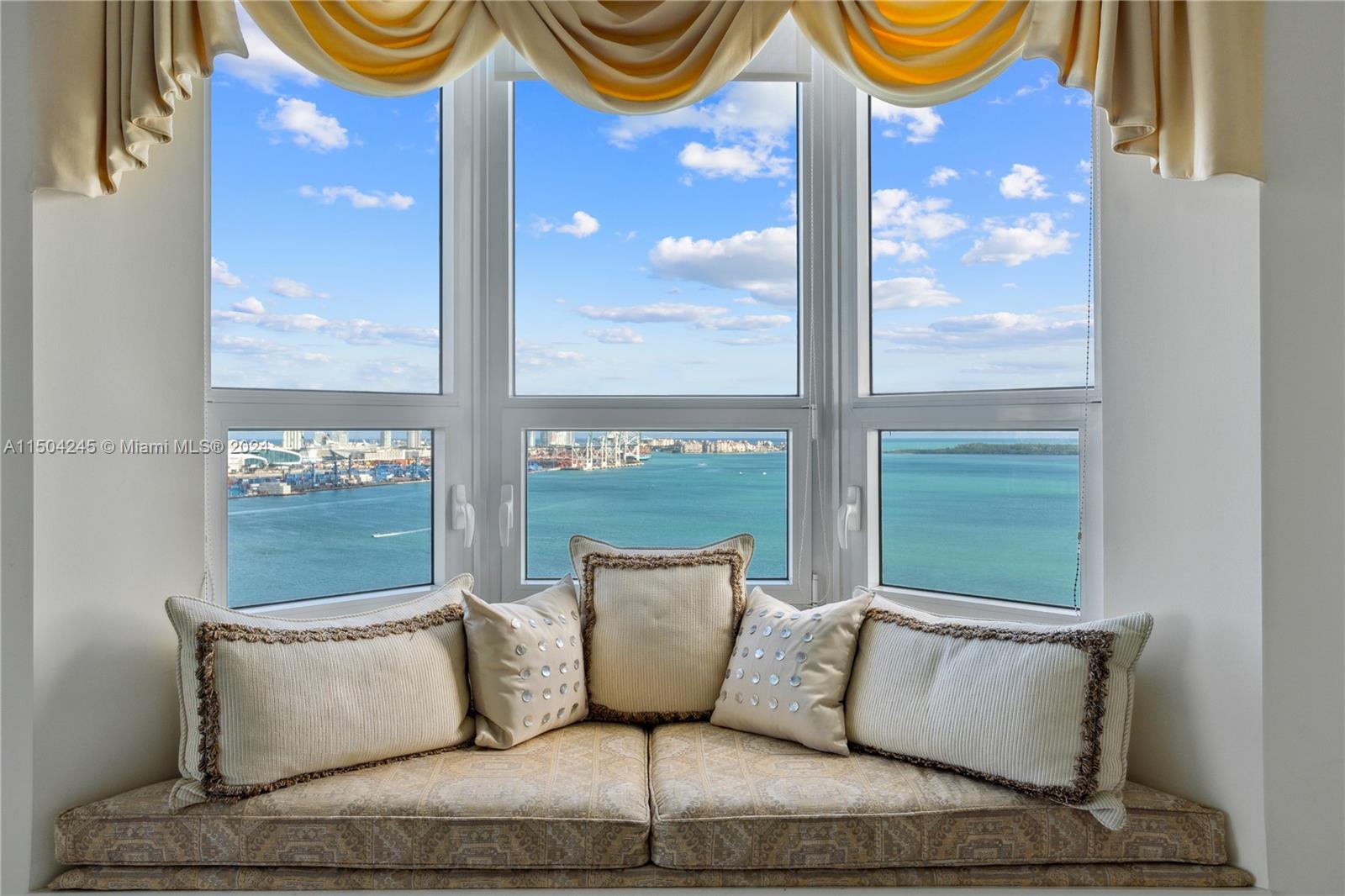 VERY RARELY AVAILABLE corner 01 Line at the Luxurious Two Tequesta Point on an Exclusive Island Oasis called Brickell Key. Your Home in the Sky is a flow-through, 3 Bed / 2.5 Bath high floor gem w/ breathtaking panoramic views of Biscayne Bay, the Ocean, Downtown Miami, Key Biscayne, South Beach, Fisher Island & the Brickell Skyline. Enjoy a giant wraparound balcony for entertaining, a master suite w/ a bay window & ensuite bathroom, built-in cabinetry, 2 assigned parking, & a spacious eat-in chef's kitchen. Building amenities include a state-of-the-art fitness center (w/ Racquetball, Basketball, Pilates, Massage & Aerobics areas), a resort style bayside pool, an elegant lobby, BBQ's, a playroom, tennis, conference rooms, free valet, 24/7 security & concierge, on-site mgmt., & a clubroom.
