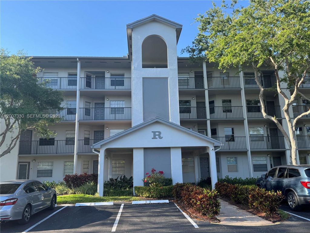 Photo of 12501 SW 14th St #112R, Pembroke Pines, FL 33027 (MLS # A12007330)