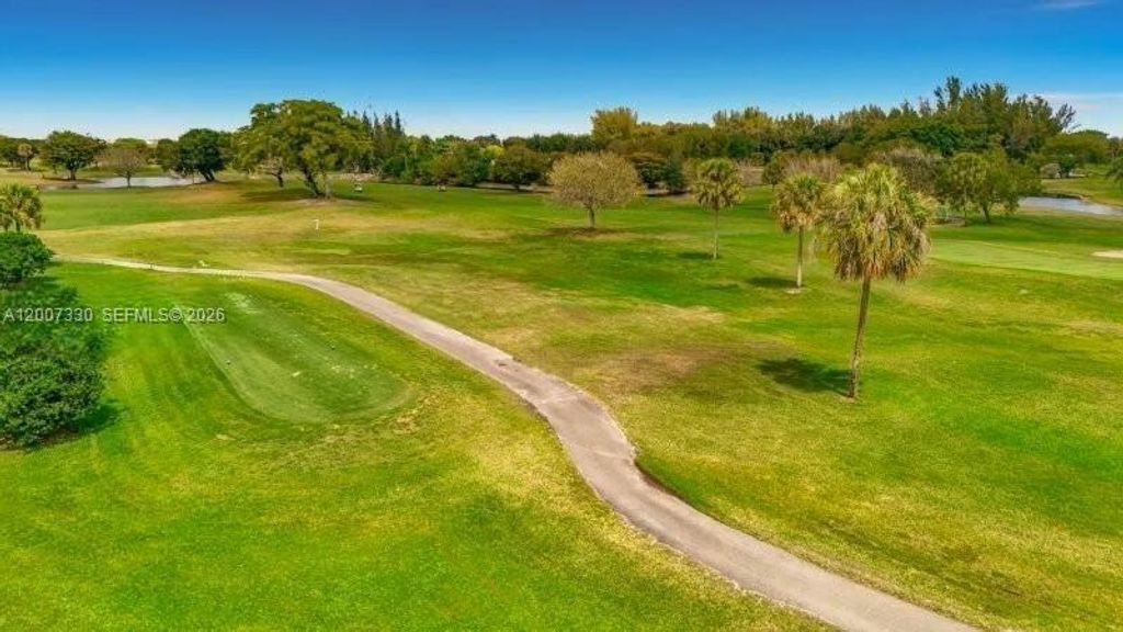 Photo of 12501 SW 14th St #112R, Pembroke Pines, FL 33027 (MLS # A12007330)