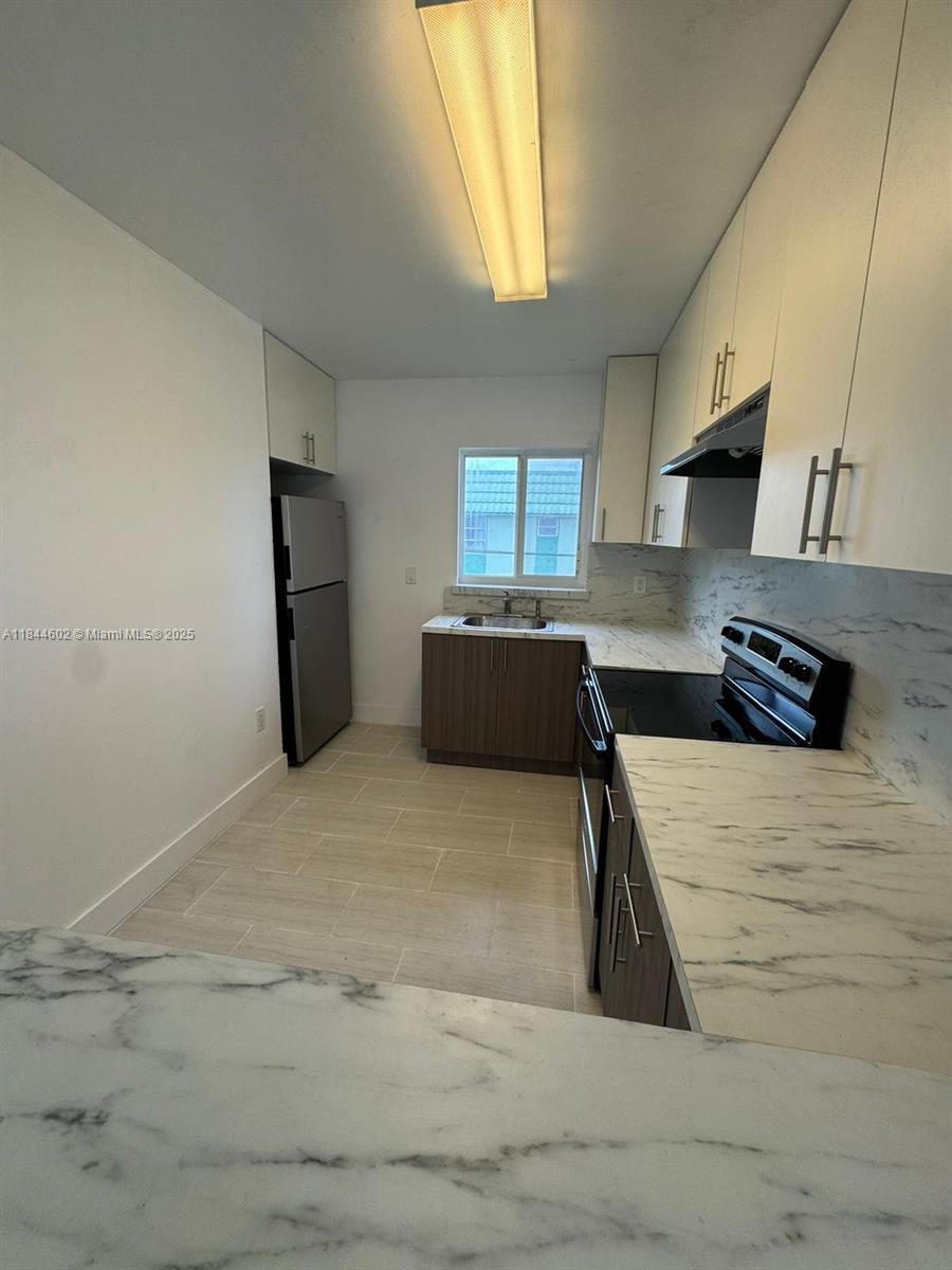 RAINEY MANORS - Residential Lease