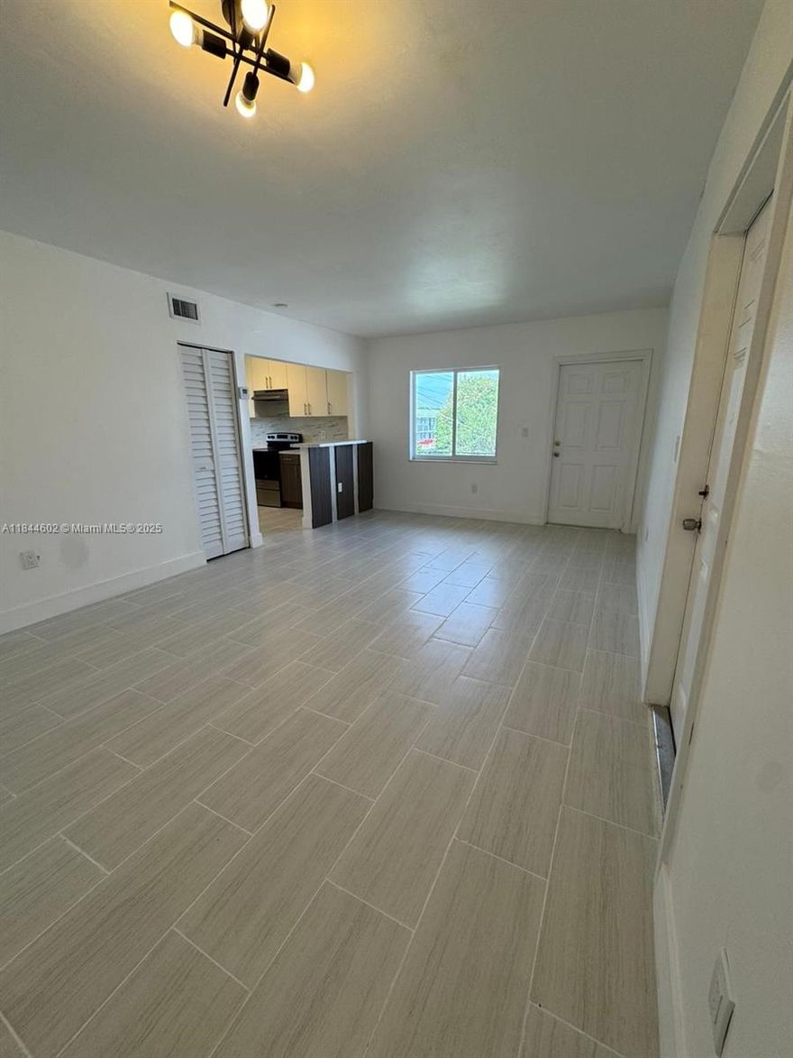 !SPECIAL ALERT! OWNER IS OFFERING HOLIDAY MOVE IN HALF OFF THE FIRST MONTH!!  

Discover the comfort and convenience of this3-bedroom, 2-bath apartment located in the desirable Rainey Manors community in the heart of Miami. This second-floor unit offers generous space with approximately 1,080 square feet of living area, making it ideal for families, professionals, or students looking for a turnkey rental with flexible lease terms. 3 Large Bedrooms: Both feature walk-in closets, soft carpeting, and large windows that invite natural light. 2 Full Bathrooms. The Kitchen is Equipped with a refrigerator and ample cabinetry; an open layout connects to the dining area. Washer and dryer available in building. 
Private Open Balcony: Perfect for morning coffee or evening relaxation.
Second Floor Entry: Provides extra privacy and quiet.