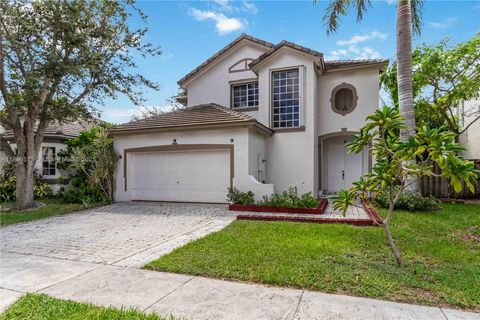 Photo of 1958 NW 100th Ave, Pembroke Pines, FL 33024 (MLS # A11860513)