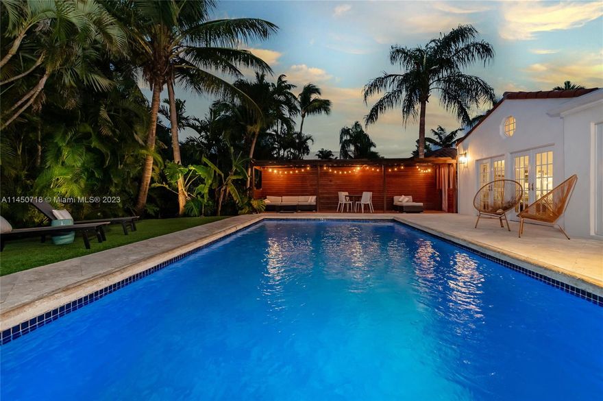 This stunning North Coconut Grove home is an absolute entertainer’s dream with its lush surroundings and beautiful backyard! This 3-bedroom, 2-bath hideaway offers the ultimate indoor–outdoor living experience with views of the pool from multiple rooms. Upgrades include remodeled bathrooms, impact windows, and updated kitchen. Kitchen upgrades include Calacatta Quartz countertops, soft-close shaker style cabinets, farmhouse sink, Gas Stove and modern appliances. The spacious primary suite will amaze you with outstanding pool views, sitting area, and 4 closets. Step out into the great big yard with an oversized in-ground pool, premium artificial grass, and wooden deck! You will feel as though you're on vacation in this beautiful private oasis! NO flood zone. Best schools nearby!