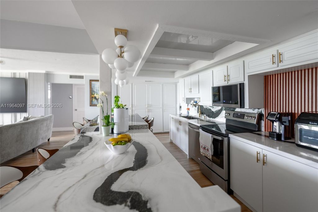 Photo of 3910 Crystal Lake Dr #401, Deerfield Beach, FL 33064 (MLS # A11964097)