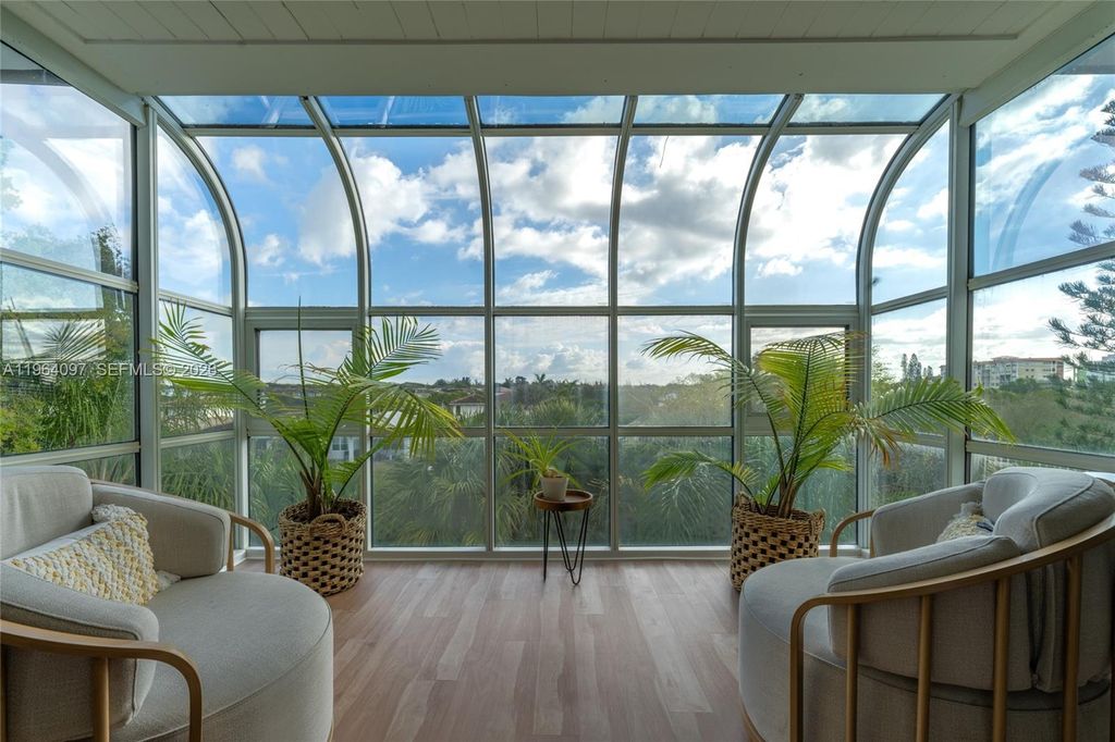 Photo of 3910 Crystal Lake Dr #401, Deerfield Beach, FL 33064 (MLS # A11964097)