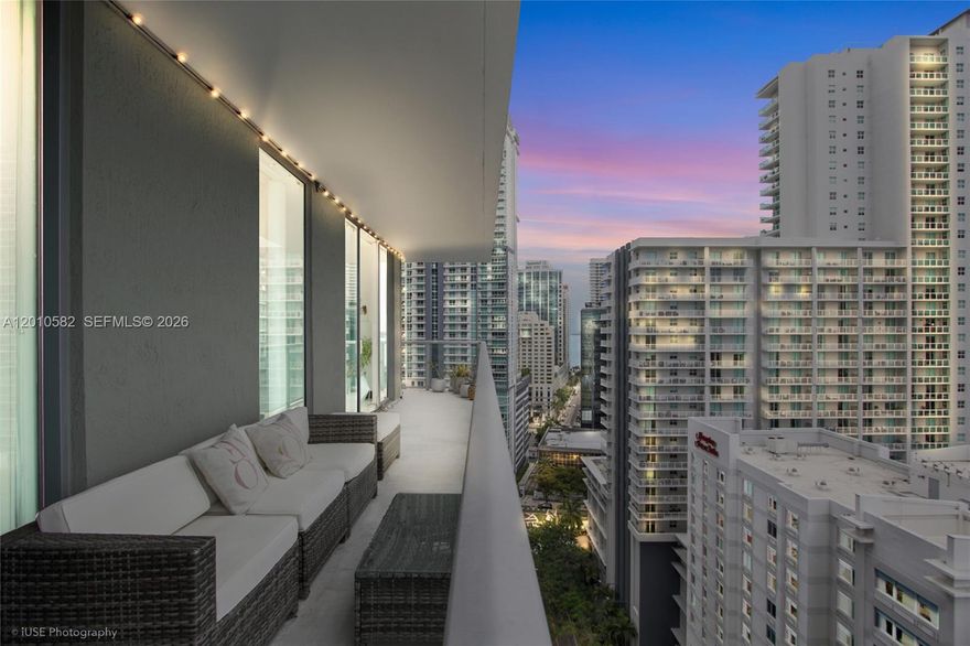 Experience elevated Brickell living from this high-floor 2-bed & 2-bath corner residence at Axis Brickell. This bright split-floor plan offers floor-to-ceiling impact glass, expansive city and sunset views, and a wraparound balcony accessible from every room. Enjoy an open-concept layout, modern finishes, abundant natural light, and an unbeatable location steps from Brickell City Centre, Mary Brickell Village, dining, shopping, MetroMover, and Metrorail. Ideal as a primary residence, second home, or investment opportunity in one of Miami’s most vibrant neighborhoods. Resort-style amenities include pools, fitness center, concierge, valet, and more.