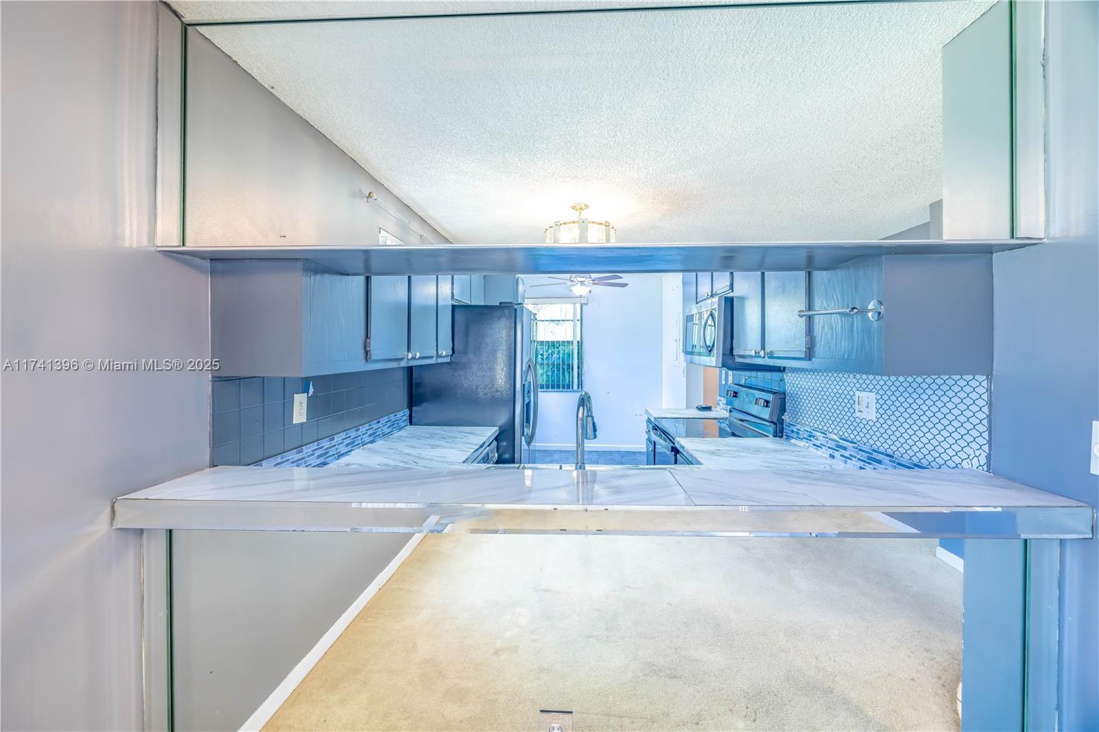 TAMARAC GARDENS - Residential