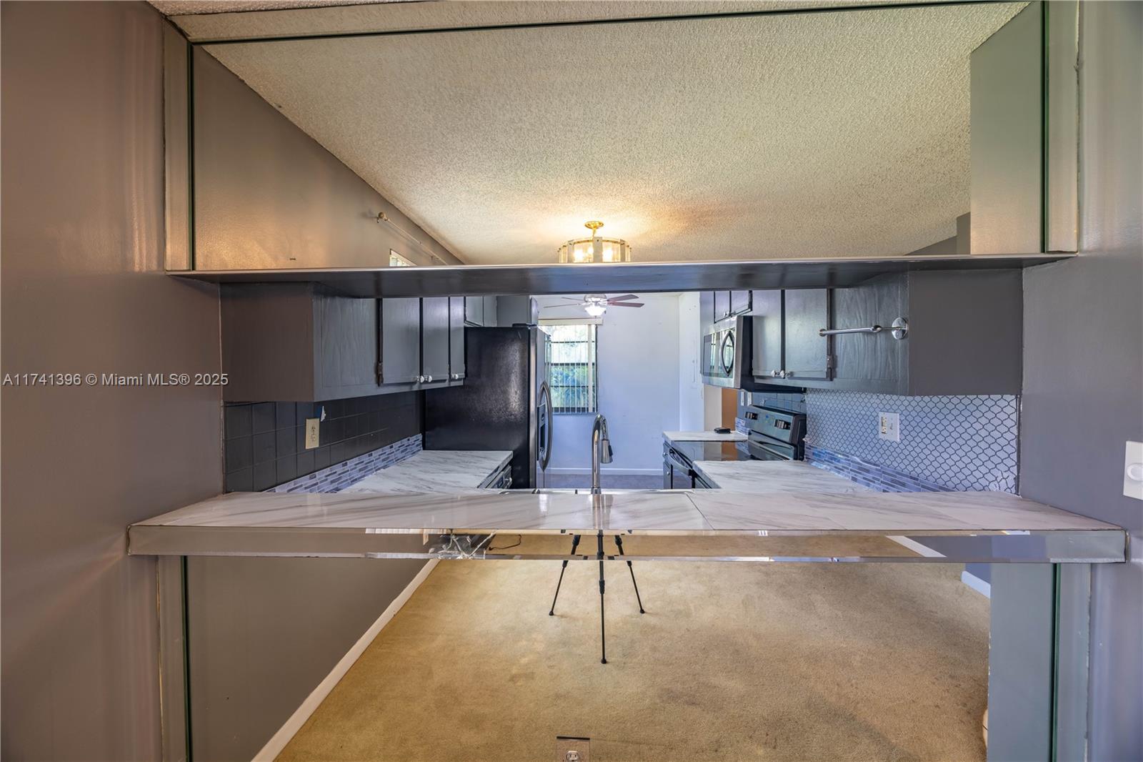 TAMARAC GARDENS - Residential