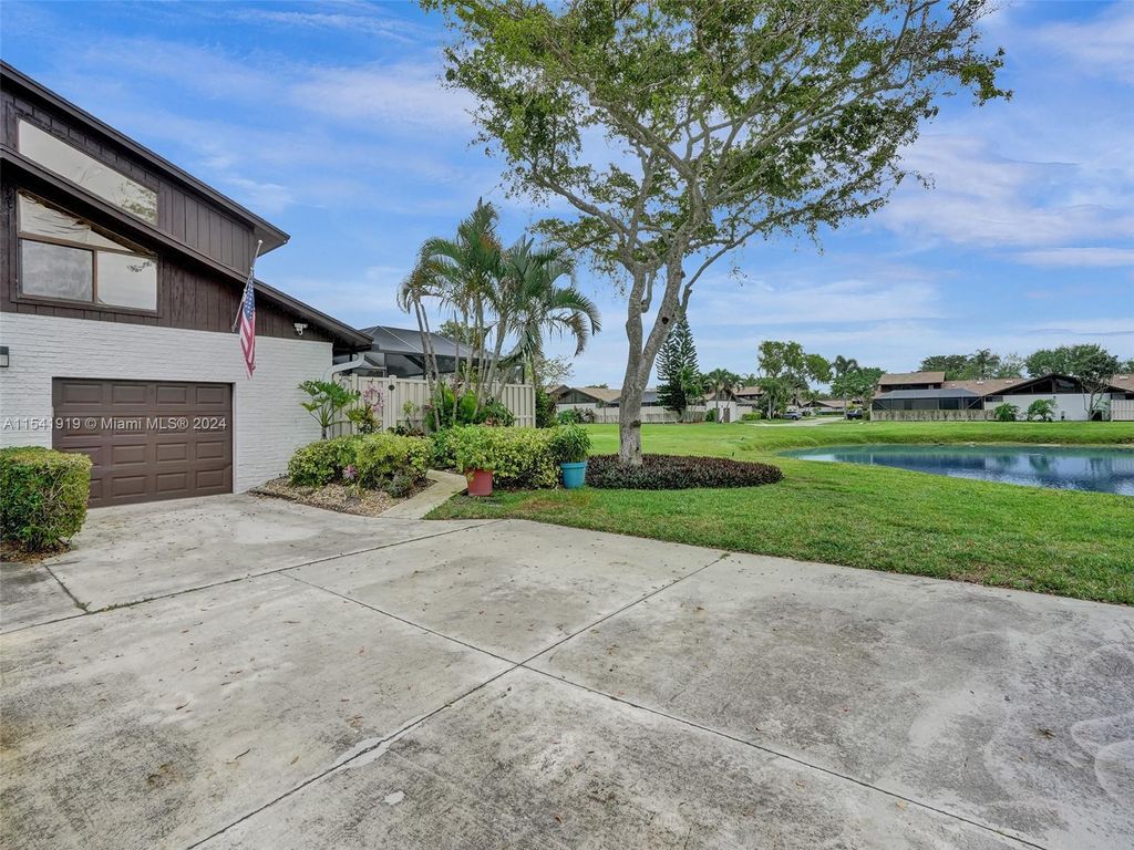 Photo of 9746 N Boca Gardens Cir N #D, Boca Raton, FL 33496 (MLS # A11541919)