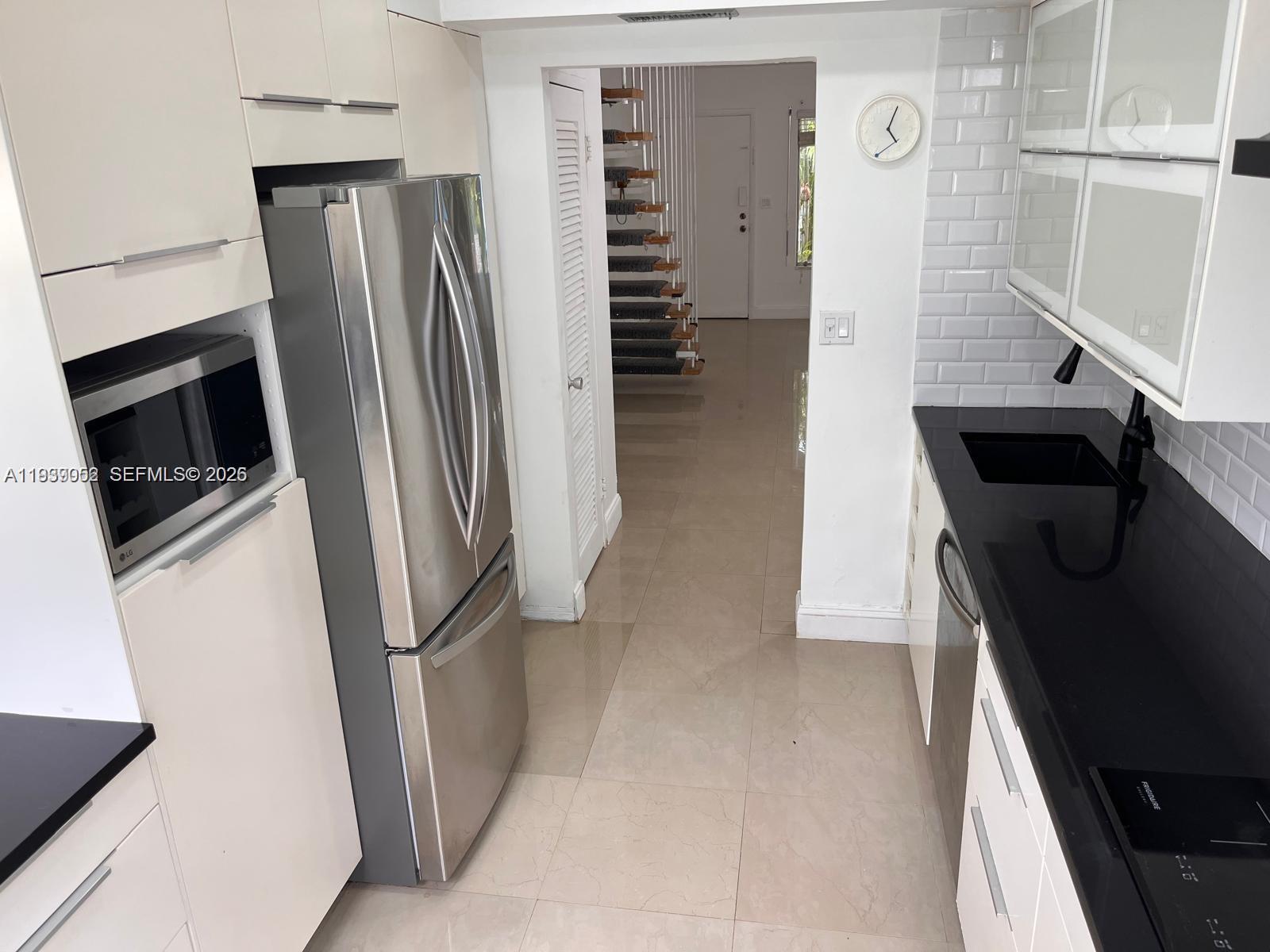 TOWN HOUSE GARDENS CONDO - Residential