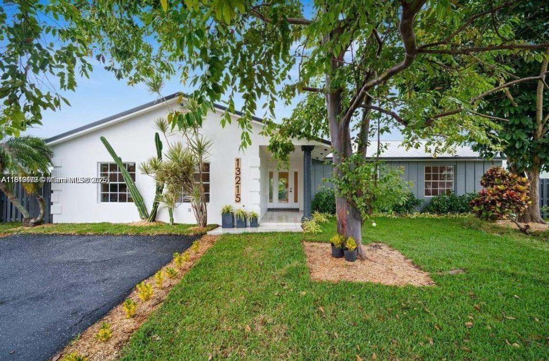THIS IS THE BEST BUYING OPPORTUNITY IN HOMESTEAD! Completely renovated 5/3. Updated plumbing and electrical. NO HOA. The entire home has been redesigned, with beautiful vaulted ceilings, all new flooring, a brand-new 5-ton AC unit, a custom-built large eat-in kitchen, all brand-new appliances, and three new large custom bathrooms. Beautifully designed layout, tons of light, and amazing flow provide a contemporary living space that is both visually appealing and practical for everyday life. Call the listing office for showing instructions. Call the listing agent.