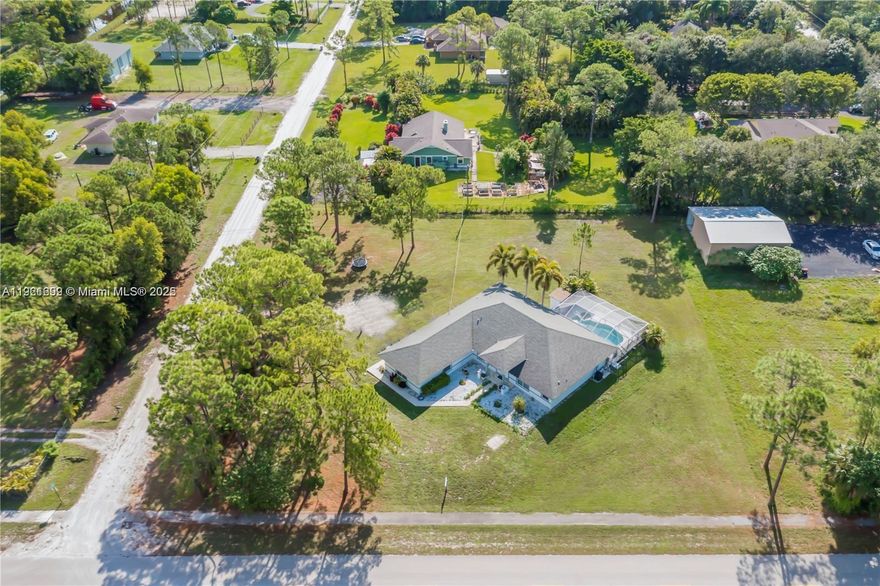 SELLER MOTIVATED!!!Amazing and immaculate Ranch style home in prime location of the Loxahatchee area on the Acreage, featuring 2715 SF air 4bedrooms,2bathrooms. Great open floorplan, vaulted ceilings, kitchen open family, formal dining room, huge master bedroom. , private and screened pool, 3 car garage. Only minutes of Publix shopping center and restaurants, Lion Country Safari, Great Schools. Don't miss this opportunity. Either a Pre-Approval or Proof of Funds Letter must be emailed before showing to the listing agent.