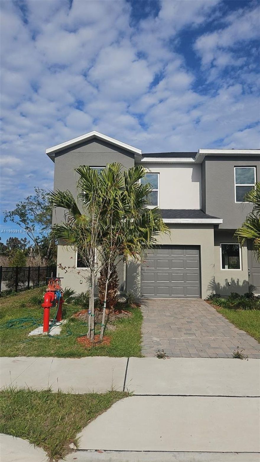 Beautiful Townhome in Sandlake Station. Stunning 3-bedroom, 2.5-bath townhome located in the highly desirable Sandlake Station community. This move-in-ready home features stylish vinyl flooring, granite countertops, and a modern kitchen equipped with stainless steel appliances, including a microwave and dishwasher. Enjoy the convenience of a washer and dryer in-unit, along with blackout window treatments for added comfort and privacy. The community offers resort-style amenities, including a clubhouse, fitness center, and swimming pool. Ideally situated in a prime Orlando location, just minutes from the Florida Mall, dining, entertainment, and major highways.