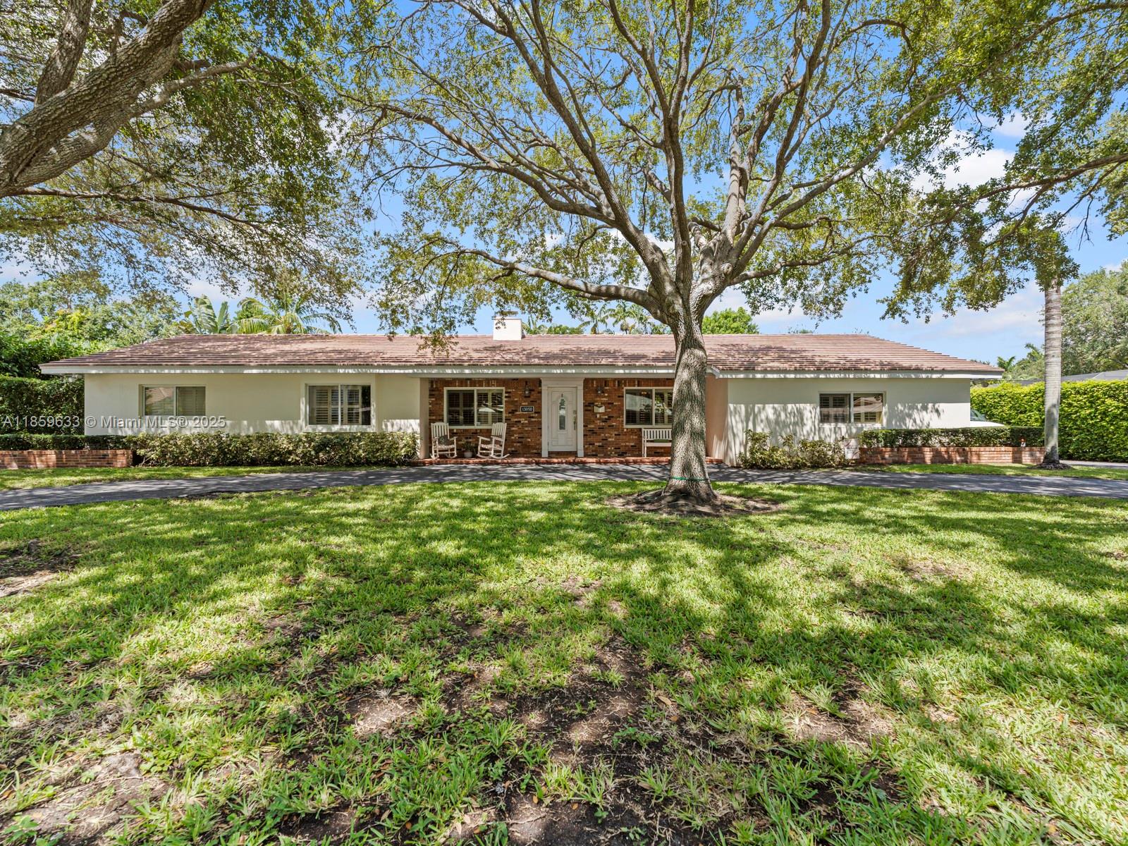 Welcome to your Pinecrest paradise! Located in a top-rated school district with excellent public and private options, this 5BR/3BA home is full of potential and perfect for entertaining. Upon entering, you’re greeted by a travertine fireplace in the sunlit family room. Plantation shutters, impact windows and doors, and two newer A/Cs (2020) provide peace of mind. The open kitchen with additional flex space flow seamlessly, making gatherings and everyday life effortless. Step outside to a sparkling pool with two cabana baths and a sprawling 15,000 SF lot—perfect for outdoor fun. Minutes from parks, dining, and shopping, this is Miami living at its finest in one of the area’s most coveted neighborhoods.