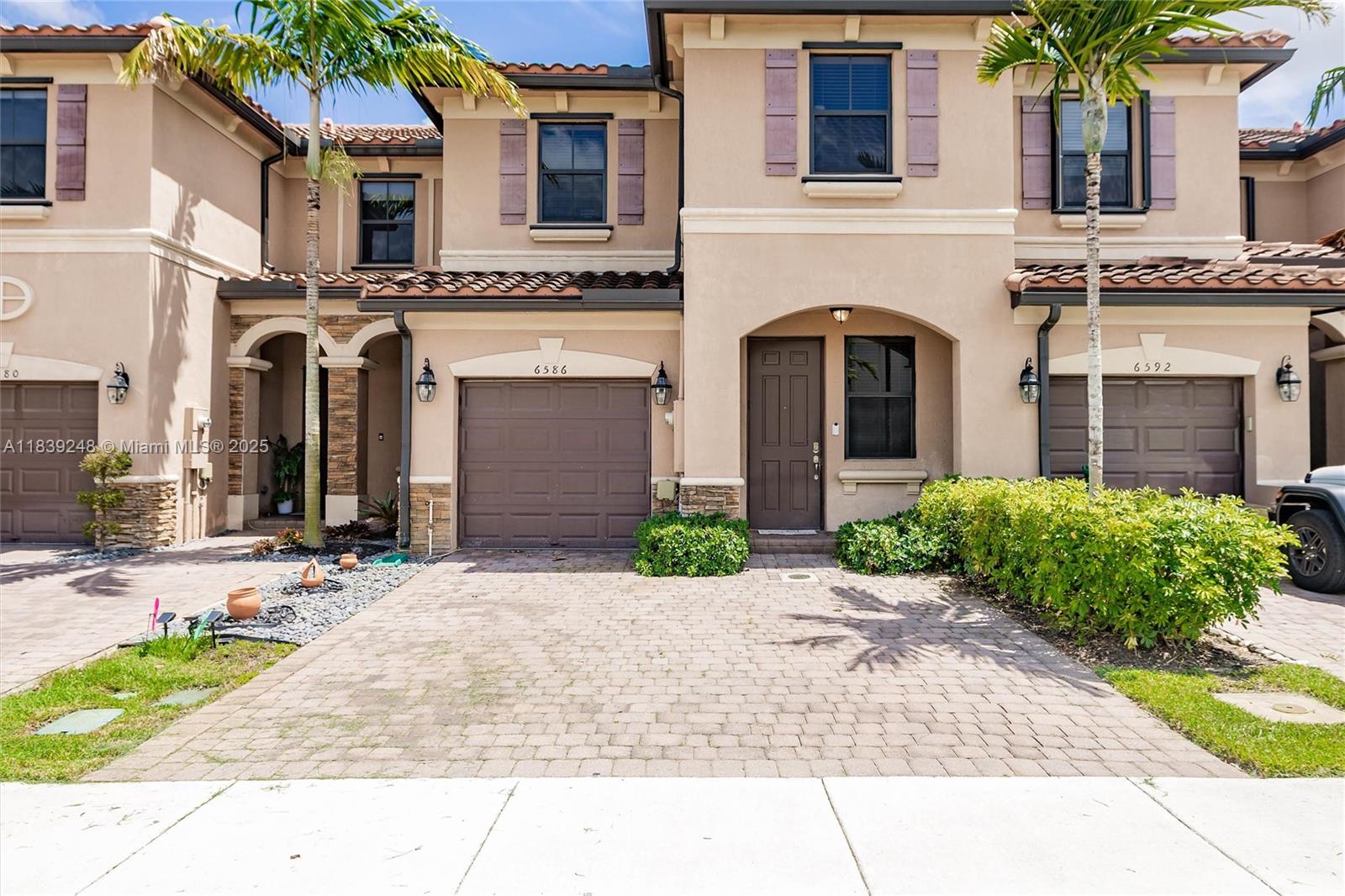 Welcome to 6586 S Anise Dr, located in the desirable Davie community of Florida. This stunning residence boasts a range of impressive features that are sure to capture your attention. Step inside to discover carpet throughout the home, providing a fresh and inviting atmosphere. Situated in a gated community, this property offers a heightened level of security and peace of mind. Residents will also enjoy access to a community pool, perfect for relaxation and recreation during those warm Florida days. One of the standout features of this home is the tankless water heater, providing energy-efficient and on-demand hot water, ensuring your comfort and convenience. With this modern amenity, you can enjoy long, soothing showers without worrying about running out of hot water.