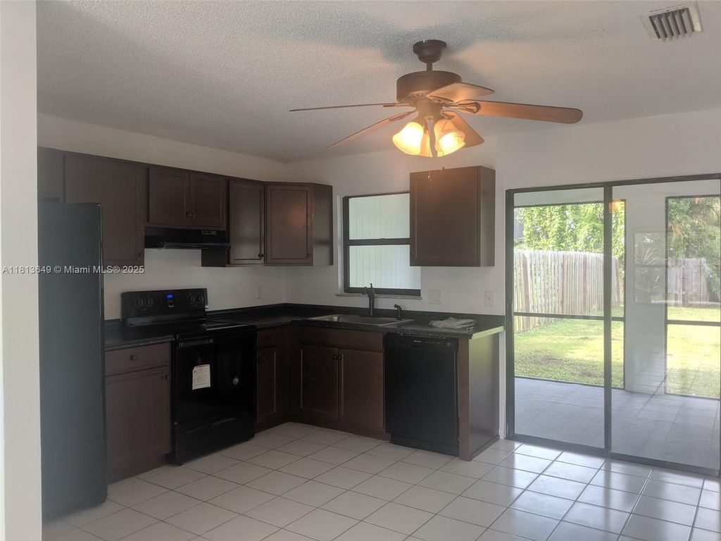 Photo of 4808-4810 SE Salvatori Road, Stuart, FL 34997 (MLS # A11813649)