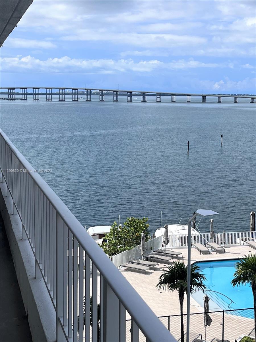 Breathtaking Biscayne Bay & Ocean views can be seen from every angle in this 1 bedroom, 1 & 1/2-bathroom condo. Open the door to newly finished hardwood floors throughout, step out onto a long balcony to watch the sunrise over the Bay. The kitchen is equipped with granite counters, stainless-steel appliances, and plenty of storage space. Amenities include: 24/7 security, concierge, swimming pool, jacuzzi, tennis court, gym, outdoor bay-side lounge, picnic & BBQ area, complementary guest parking and onsite sushi restaurant (Obba Sushi). Brickell Harbor's walking distance from Brickell Financial District. Enjoy Brickell's nightlife and restaurants, near Publix, and the people mover; and outdoor sports activities in Key Biscayne. Live the Miami lifestyle!