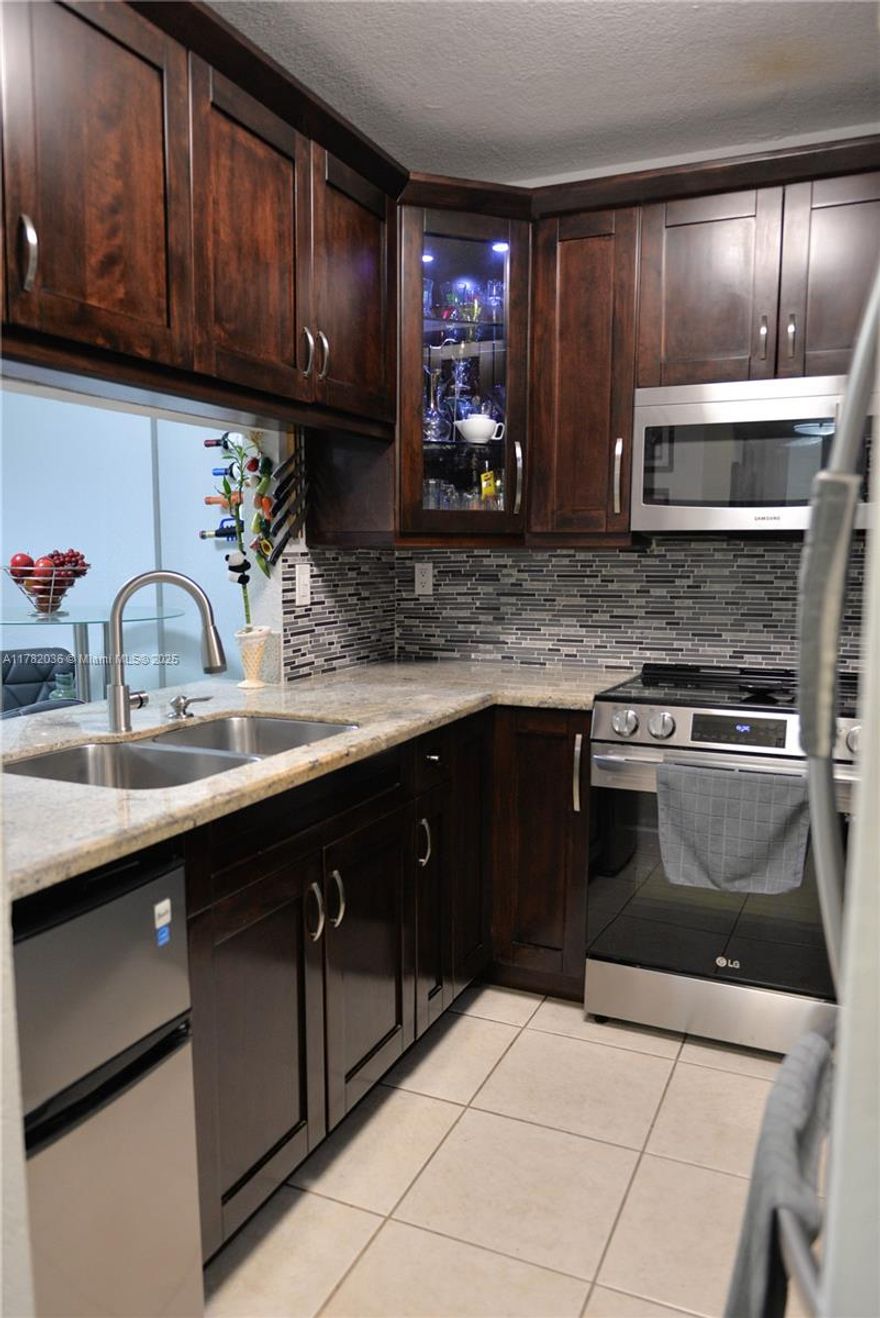 Step into this beautifully remodeled and move-in ready condo offering the perfect blend of comfort and style. Featuring a spacious layout w/natural light, this 1bed/1bath unit boasts elegant tile flooring throughout and a private balcony for your enjoyment.
The kitchen is equipped w/SS appliances/Add'll mini fridge, complemented by modern finishes and ample cabinet space. Enjoy the convenience of an in-unit W/D plus a common laundry room on every floor. The bedroom includes a walk-in closet. Upgrades include a 2020 A/C system and a 2020 tankless water heater. The community pool, and the unit comes with one assigned parking space along with plenty of guest parking.
Centrally located in the sought-after Kendall area, near top-rated schools,shopping,dining, easy access to major expressways.