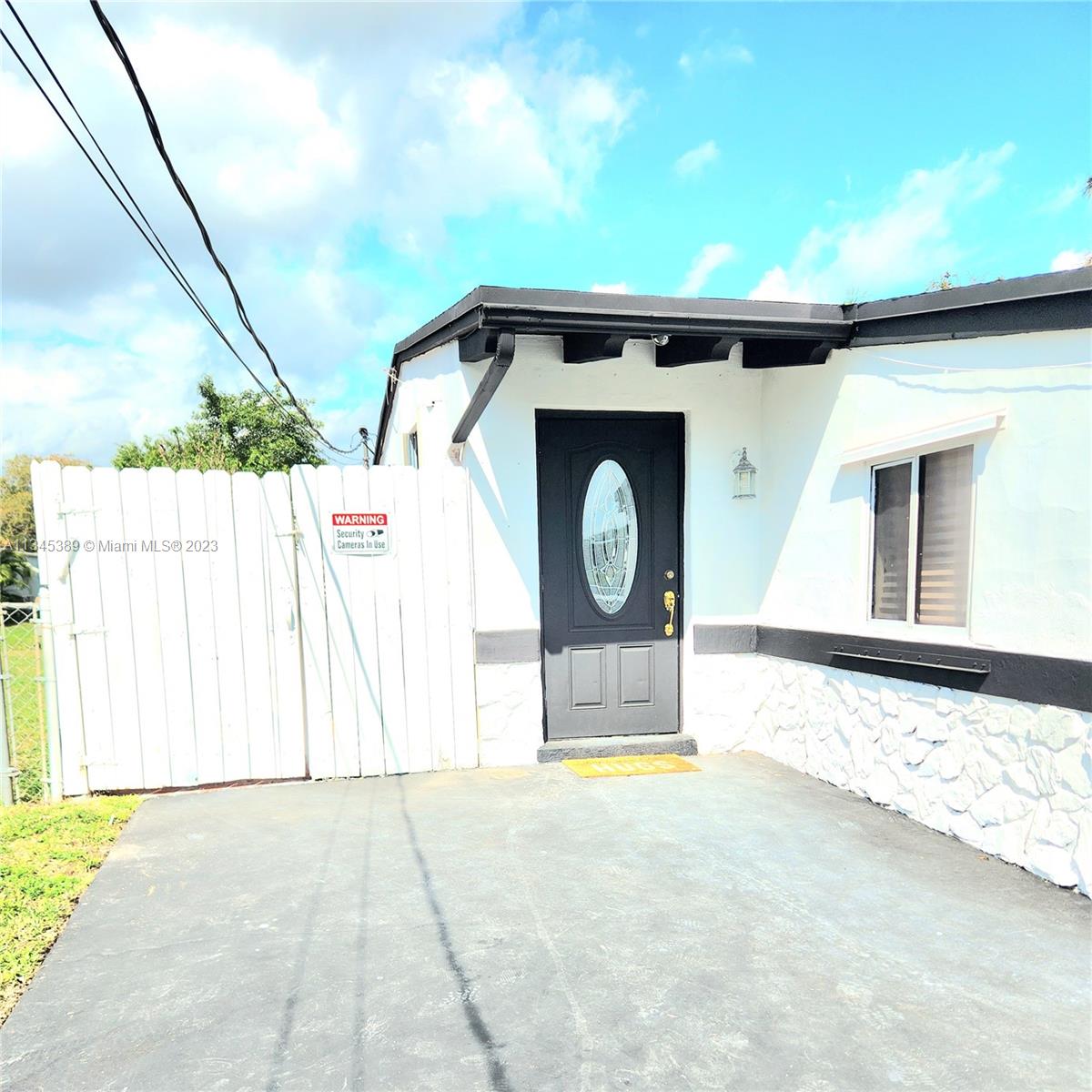 Photo 3 of 74 of 6089 NW 27th St house