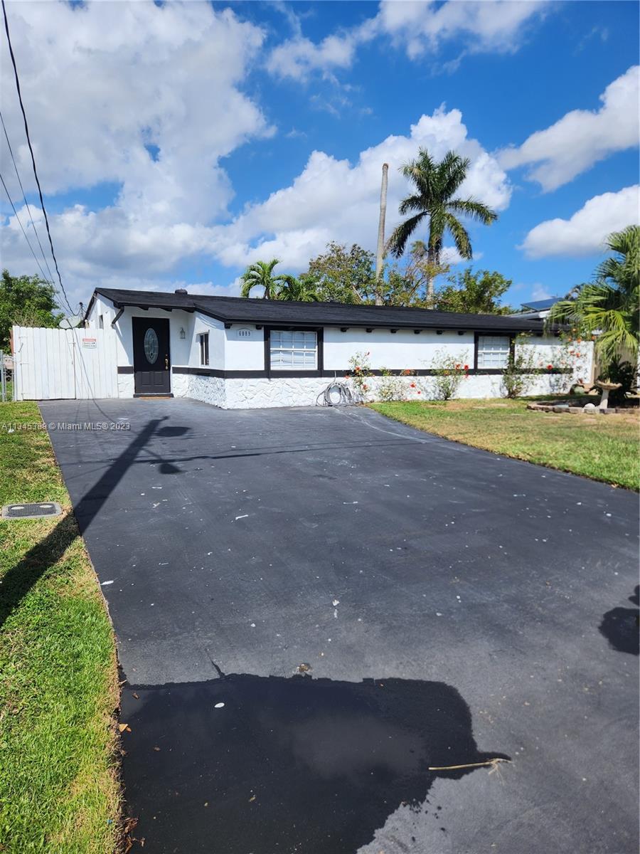 Photo 5 of 74 of 6089 NW 27th St house