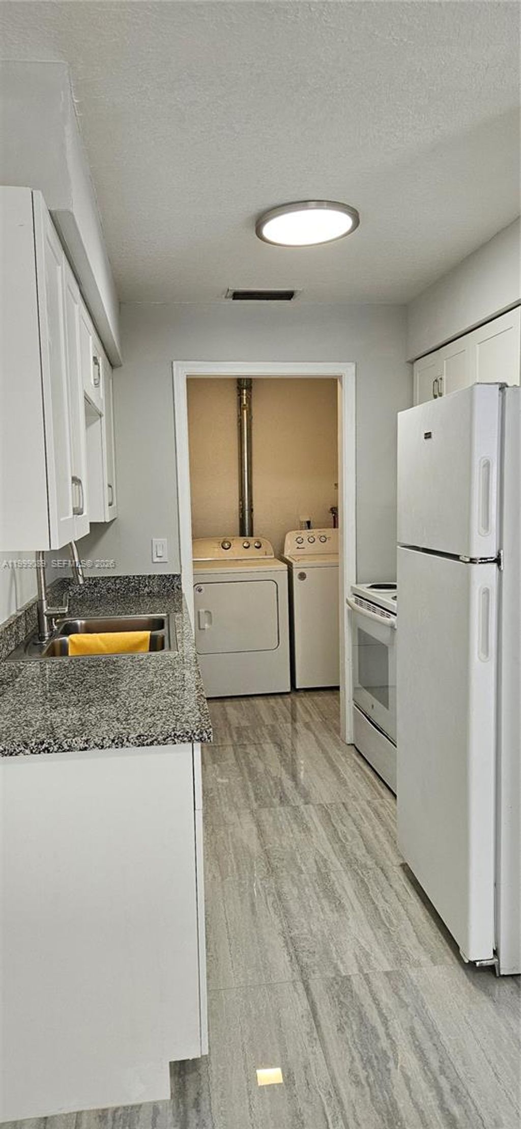 Photo of 1408 SW 9th Ave #1408, Fort Lauderdale, FL 33315 (MLS # A11999089)