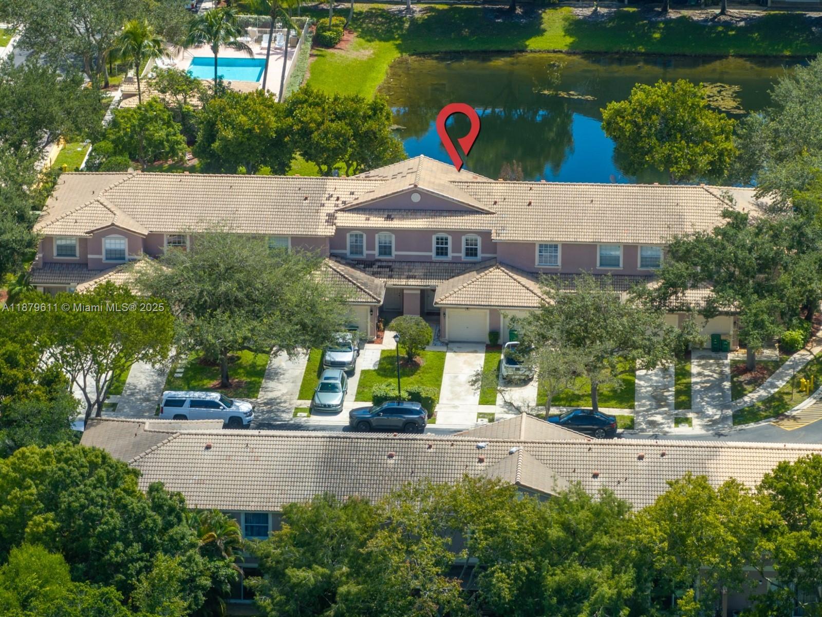 Affordable and stylishly renovated waterfront townhouse in the gated community of Southgate Shores. This 2-bedroom, 2.5-bath home with 1-car garage features impact windows and doors, remodeled bathrooms, and an open-concept kitchen with stainless steel appliances, granite countertops, and custom cabinetry. The living area opens to a private patio with serene lake views. Upstairs offers two spacious master suites with walk-in closets and fully renovated bathrooms. Laundry is conveniently located upstairs. Community amenities include a pool, and the location provides easy access to shopping, dining, and major highways and roads. Move-in ready and perfect for first-time buyers!