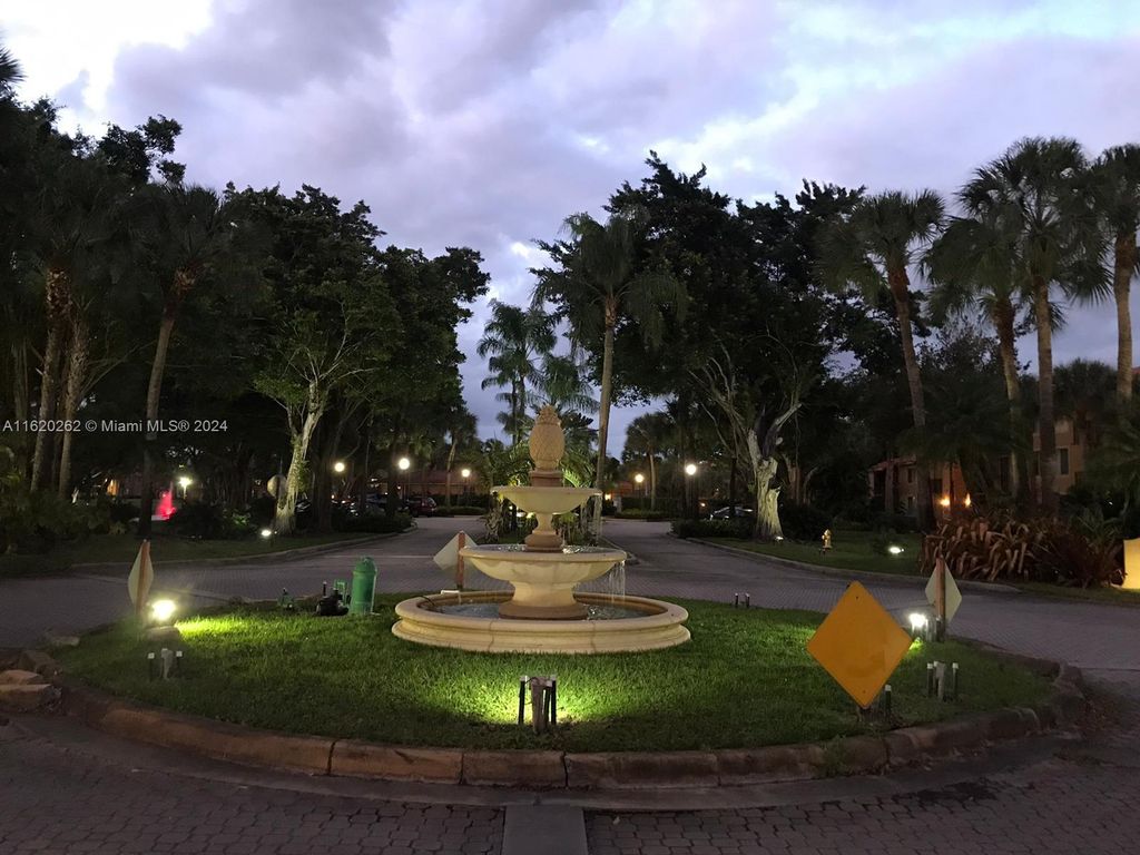 Photo of 10773 Cleary Blvd #210, Plantation, FL 33324 (MLS # A11620262)