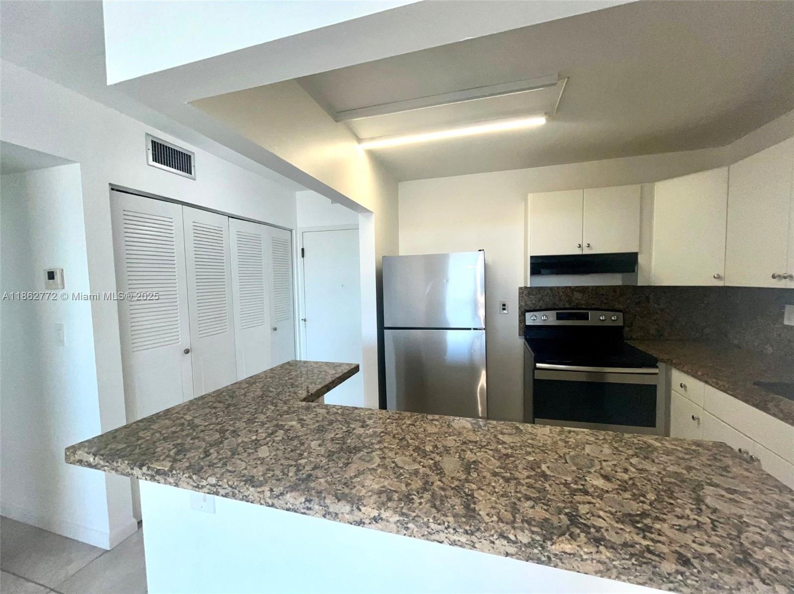 Bright and spacious 1-bedroom, 1-bath condo in the heart of North Miami, kitchen with granite countertops, SS appliances, and a convenient breakfast bar. The open layout makes it perfect for both everyday living and entertaining. A large bedroom with walk-in closet, and a private balcony with breathtaking skyline view, perfect for enjoying sunrise and sunset. Located on a high floor, offering enhanced views and abundant natural light. Gated community with pool, parking, laundry on every floor, and extra storage. Ideally near Biscayne Blvd, major highways, shopping, restaurants, Whole Foods, LA Fitness, and universities (FIU, Johnson & Wales). Minutes from beaches, fine dining, and luxury shopping. Low HOA and no special assessment. Quick HOA approval. No leasing first year. Move-in ready.