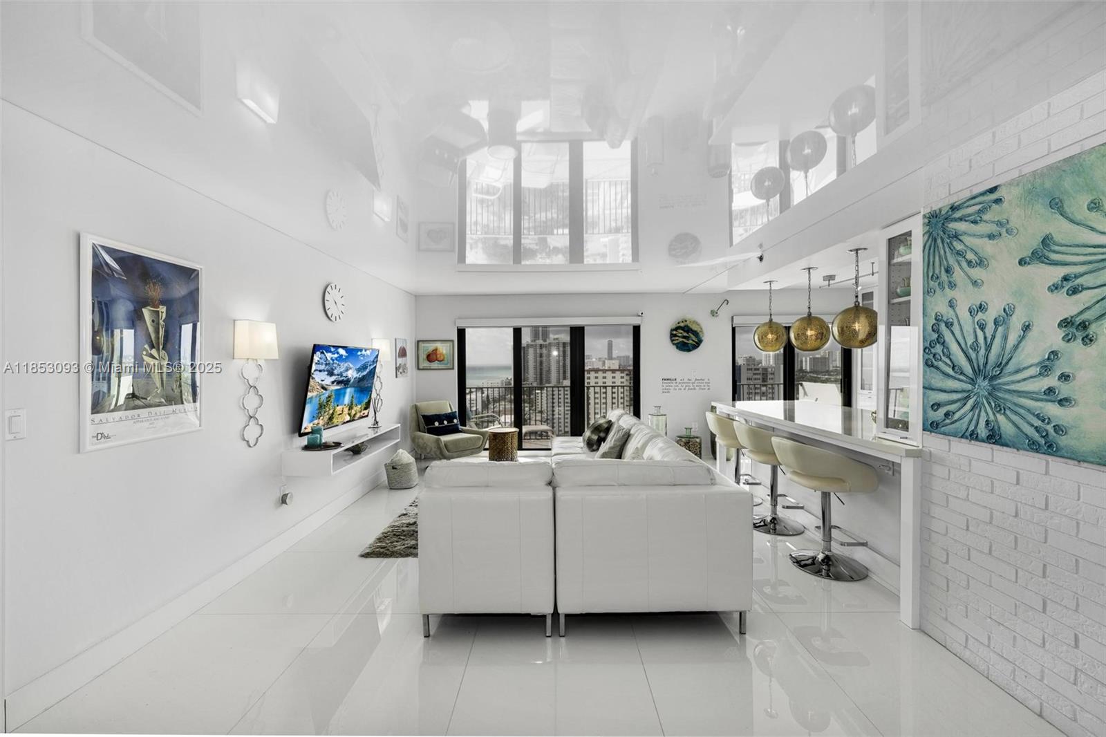 Modern, Beachy, Classic Seaside Oasis at The Summit. Beautifully remodeled and upgraded, ready to move in beachfront condo on Hollywood Beach. 2 bed/2 bath features southern views of the ocean and intracoastal, Tastefully and professionally designed featuring white porcelain floor tiles, extenso ceiling, open kitchen, finished closets, renovated bathrooms, impact windows, spacious balcony, washer/dryer and more. Steps from the Ocean, Boardwalk, shops and restaurants. Summit Towers features 2 pools, tennis courts, shuffle board, Bocce, putting green, basketball, BBQ area, private restaurant, 24 hour security and much more. Unit includes covered parking
spot and extra storage.