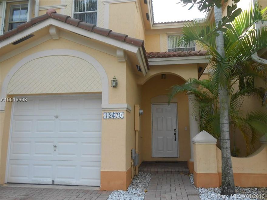 Ready to move in, impeccable townhouse located right on 122 St with guest parking spaces right across the street.  Living, Dining and Family Room, tile floors throughout the first floor; master and two more bedrooms on second story; laminated floors throughout second floor.  Ceiling fans in bedrooms and family room.  Vertical blinds on windows and sliding door in family room.  Very cozy.