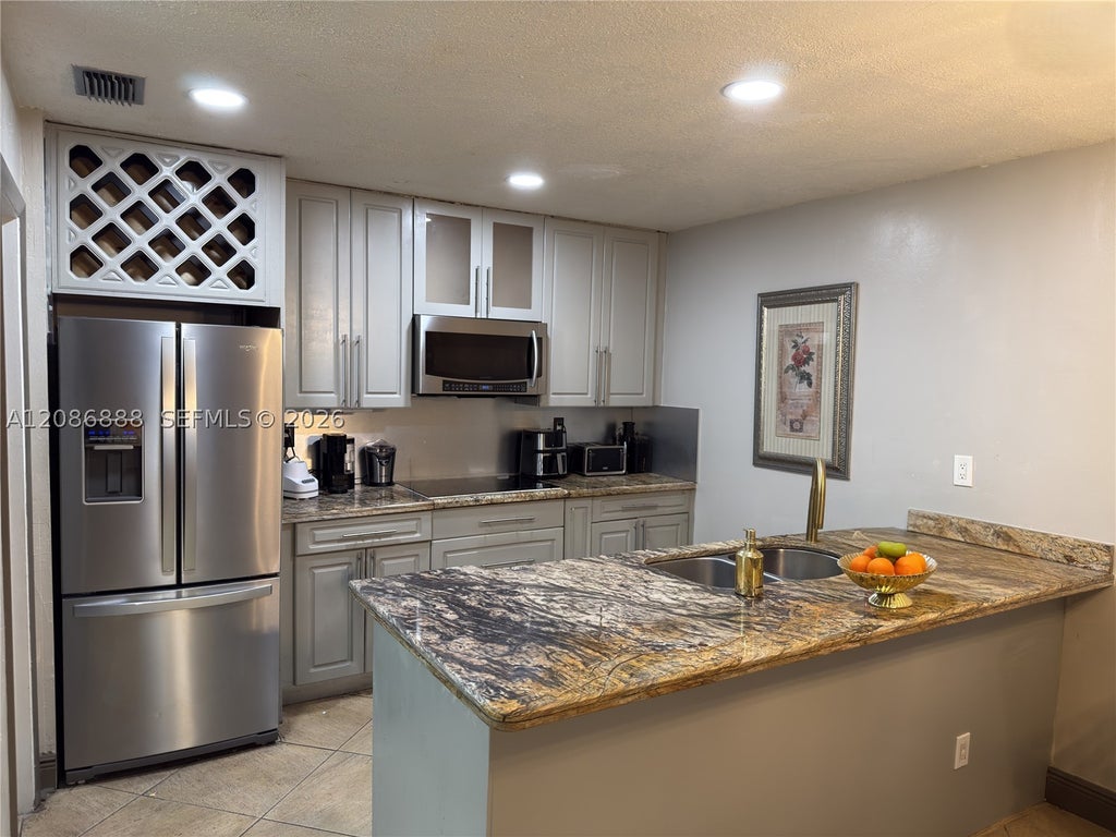 Photo of 1250 SW 113th Ter #201, Pembroke Pines, FL 33025 (MLS # A12086888)