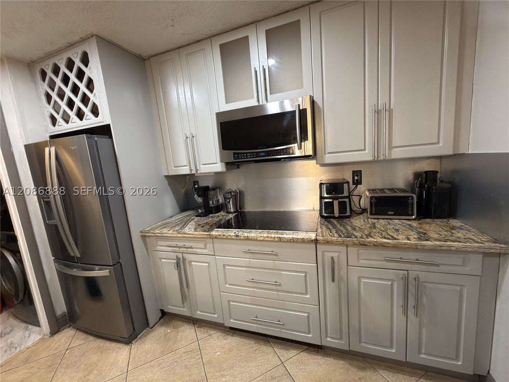 Photo of 1250 SW 113th Ter #201, Pembroke Pines, FL 33025 (MLS # A12086888)