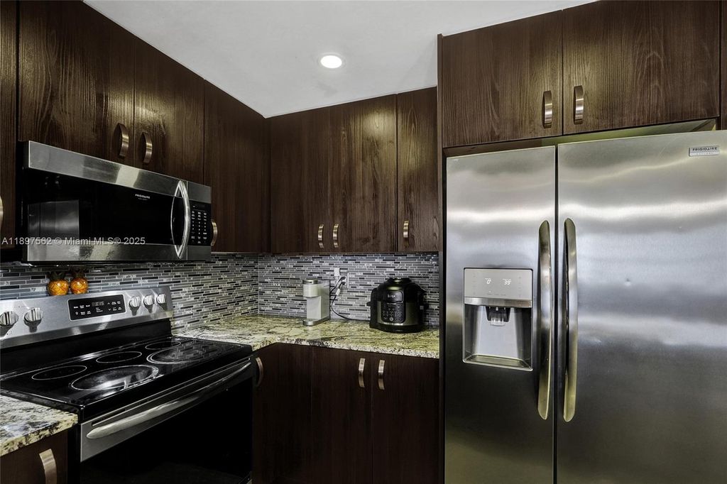 Photo of 4314 NW 9th Ave #3-3D, Deerfield Beach, FL 33064 (MLS # A11897562)